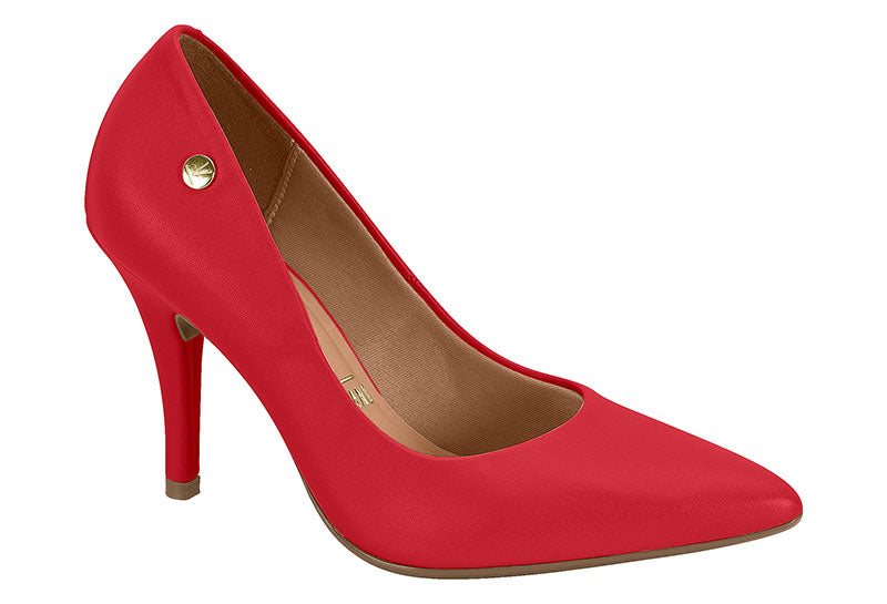 Product shot of a vibrant red pointed-toe high-heel featuring a gold-toned accent and a light brown insole showcasing the shoe's sleek design and sophisticated style