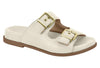 Product shot of a cream-colored leather sandal with two gold buckles and a brown sole showing off its unique design and comfortable features