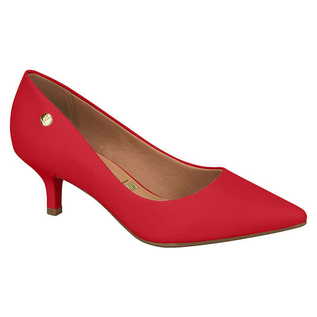 Product shot of a vibrant red women's kitten heel shoe featuring a gold logo detail and a pointed toe showcasing a minimalist design