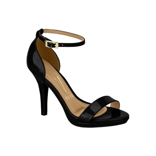 Product shot of a Schutz black patent leather stiletto sandal featuring a gold buckle and a tan insole.