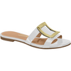 Product shot of a white patent leather sandal with a gold buckle featuring a beige insole and a flat sole