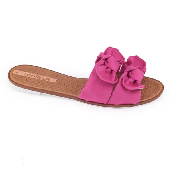 Moleca pink fabric slide sandals featuring double bow details brown insole and white sole
