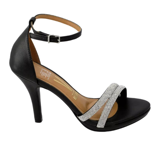 Product shot of a black Vizzano stiletto sandal adorned with sparkling rhinestone straps and featuring a delicate ankle buckle showcasing elegant design and luxurious details
