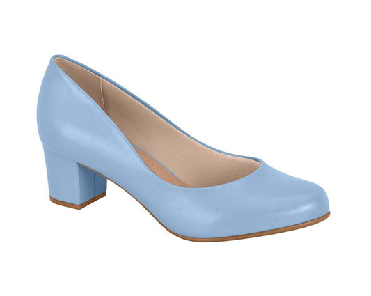 Product shot of a light blue women's low block heel pump featuring a slightly squared toe and subtle sheen on a white background
