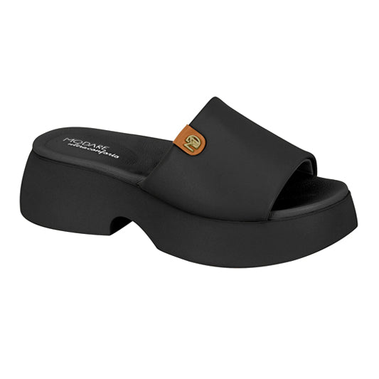 Modare Ultraconforto black platform slide sandal featuring a tan and gold logo detail and a chunky sole
