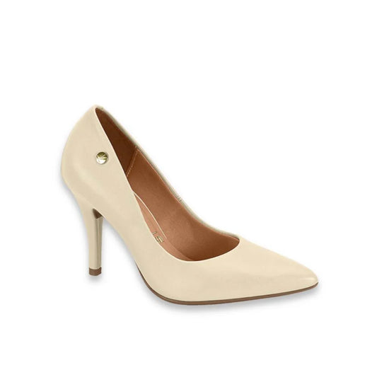 Product shot of a cream-colored leather women's high-heeled pump featuring a pointed toe, a small gold button accent, and a subtle sheen on the smooth leather upper.
