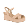Product shot of a beige Celio platform wedge sandal featuring a crisscross strap design a gold buckle and a cushioned footbed
