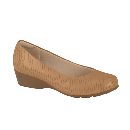 Product shot of a beige women's wedge shoe featuring a perforated pattern a rounded toe and a low wedge heel
