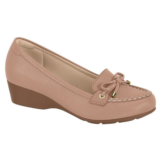Product shot of a blush-pink wedge loafer featuring a dainty bow gold accents and a textured sole
