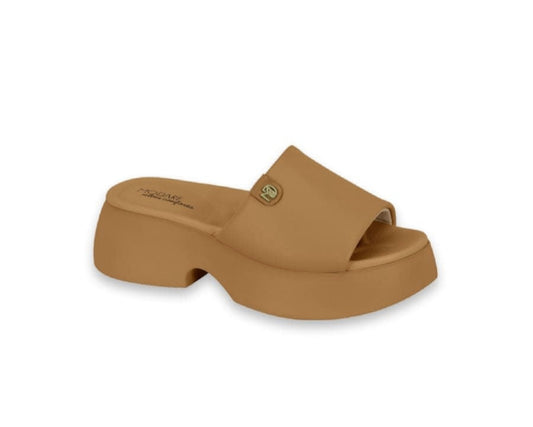 Product shot of a tan Modare platform slide sandal featuring a gold logo and a chunky sole
