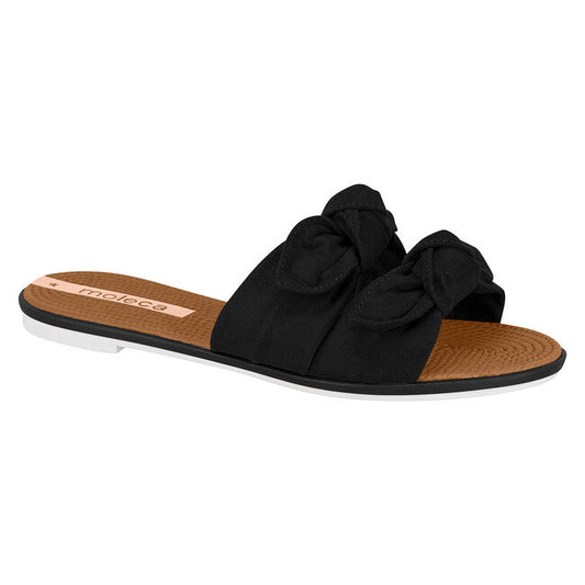 Moleca black slide sandal with double fabric knots brown footbed and white sole
