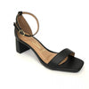 Vizzano black leather ankle-strap heeled sandal with a gold buckle and square toe featuring a low block heel and cushioned insole
