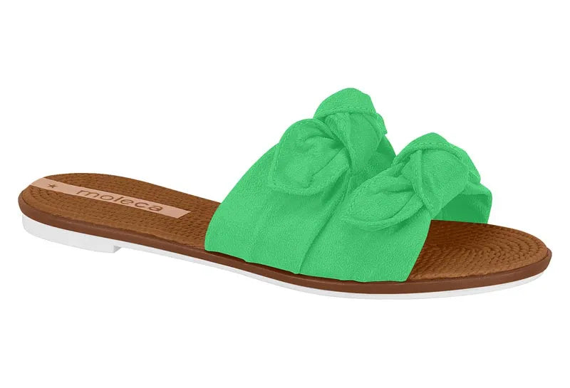 Moleca lime green knotted suede slide sandals featuring a brown and white sole and a unique double bow design

