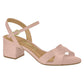 Product shot of a Vizzano blush pink low block heel sandal featuring a crisscross strap design and gold buckle detail
