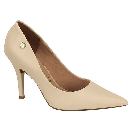 Product shot of a beige Vizzano women's pointed-toe stiletto featuring a gold logo,  a brown insole and a sleek silhouette
