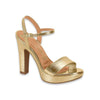 Product shot of a gold Vizzano platform sandal featuring a chunky heel ankle strap and metallic sheen
