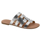 Silver metallic snakeskin slide sandal with a cutout design featuring a neutral-toned sole and thin gold accents
