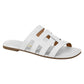 Product shot of a white leather slide sandal with cutout details featuring a brown sole and subtly embossed branding
